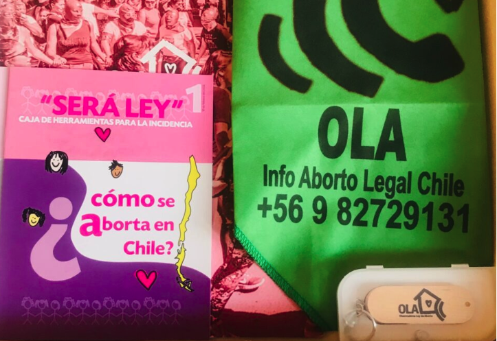 Fotografía en la que posan representantes de OLA Chile, Comité de Mujeres de la ISP, FENPRUSS y CONFUSAM
